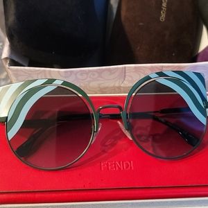 Green with straps cat eye make offer